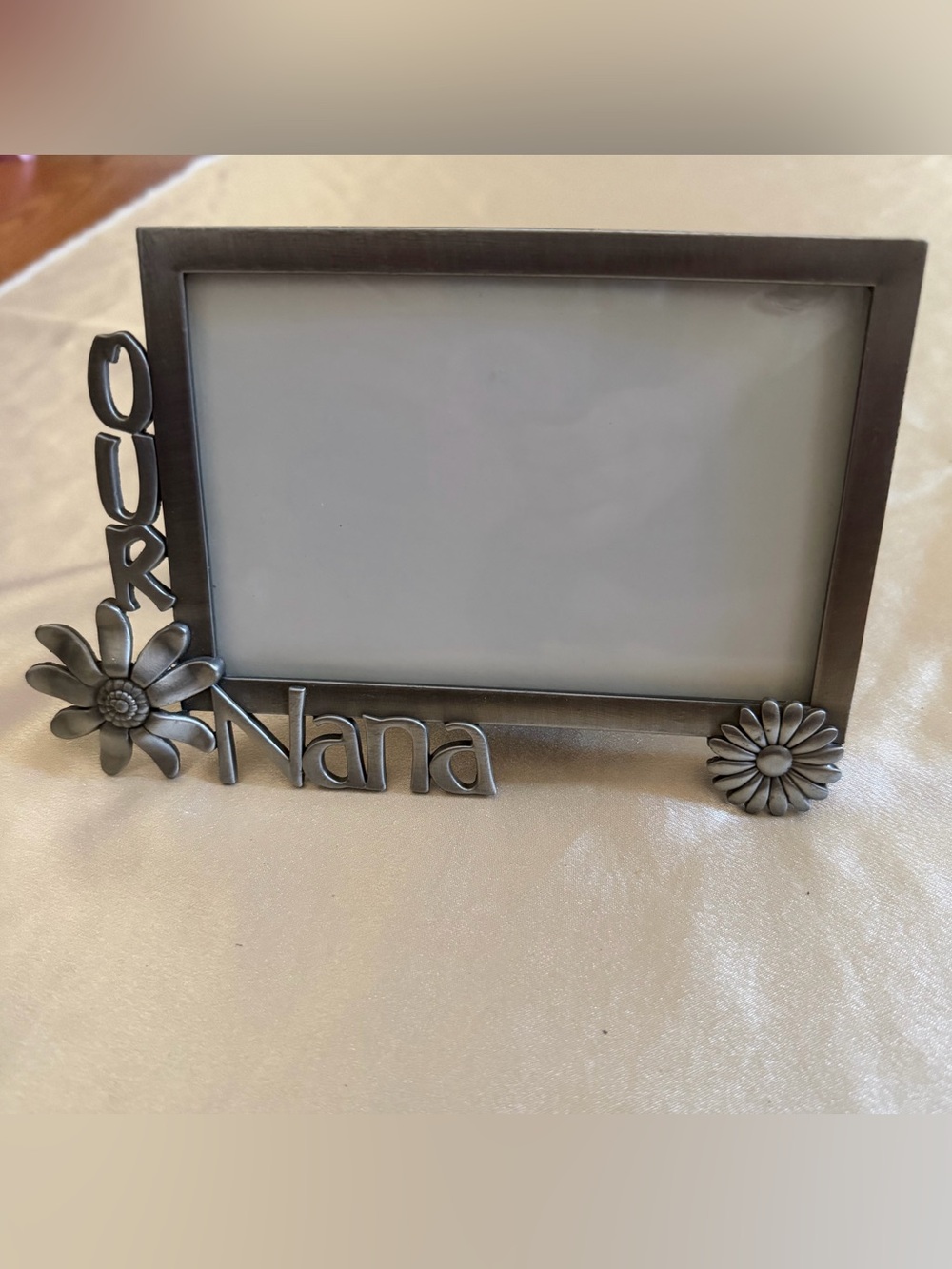 vintage Fetco pewter "Our Nana" picture frame accented w/ daisy flower motifs.